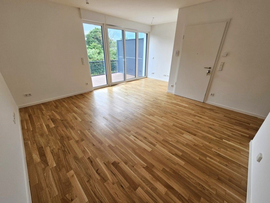 Energieeffizientes Wohnen in ruhiger Lage - Hochwertige 3-Zimmerwohnung mit Balkon & Garten & SP - Foto 2